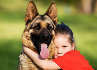 little girl and dog together