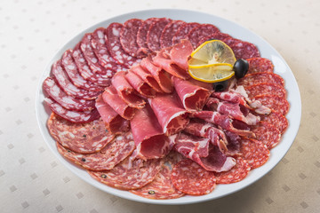 Meat plate set with salami, bacon