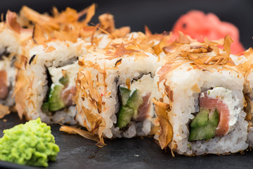 Fresh sushi on a black slate
