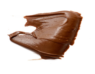 Cream chocolate spreading isolated over white backround. Food background for your design