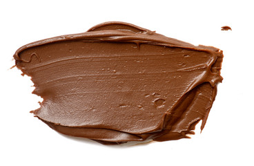Cream chocolate spreading isolated over white backround. Food background for your design
