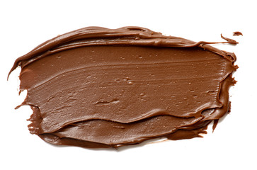 Cream chocolate spreading isolated over white backround. Food background for your design
