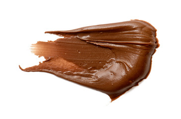 Cream chocolate spreading isolated over white backround. Food background for your design