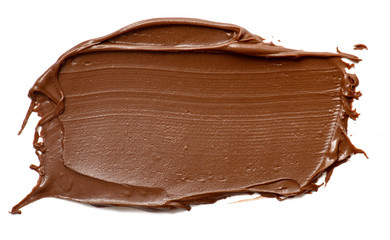 Cream chocolate spreading isolated over white backround. Food background for your design