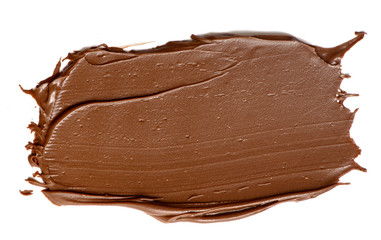 Cream chocolate spreading isolated over white backround. Food background for your design