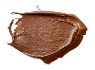 Cream chocolate spreading isolated over white backround. Food background for your design