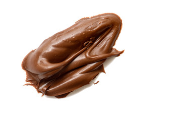 Cream chocolate spreading isolated over white backround. Food background for your design