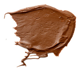 Cream chocolate spreading isolated over white backround. Food background for your design