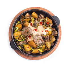 Meat hot frying pan with potatoes, vegetables