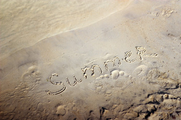 
Word summer on the sand.