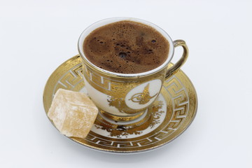 Turkish coffee  and Turkish delight on a white background