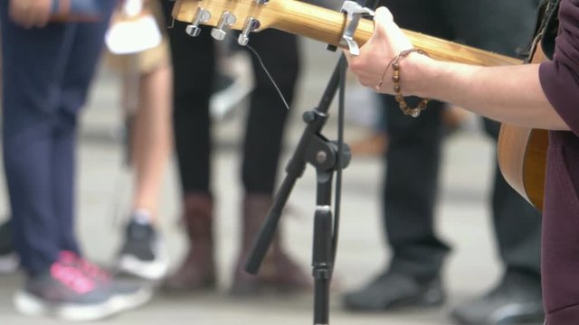 Professional video of Young musican player in 4K slow motion 60fps