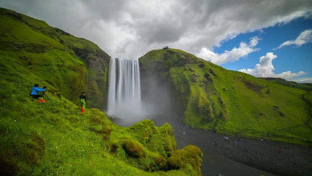 4K Timelapse Of Moving Clouds at iceland waterfall Skogarfoss in Summer of Iceland