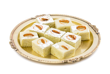 Indian Sweet Food Badam Barfi Also Know As Mithai, barfee, Mawa Barfi, Mava barfi, Almond Sweet, khoya Burfi Indian Popular Sweet Made up of Coconut, Mawa, Milk and Sugar isolated on white background