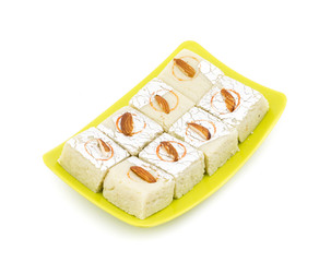 Indian Sweet Food Badam Barfi Also Know As Mithai, barfee, Mawa Barfi, Mava barfi, Almond Sweet, khoya Burfi Indian Popular Sweet Made up of Coconut, Mawa, Milk and Sugar isolated on white background