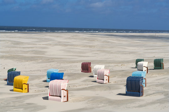 Background of multi colored beach chairs
