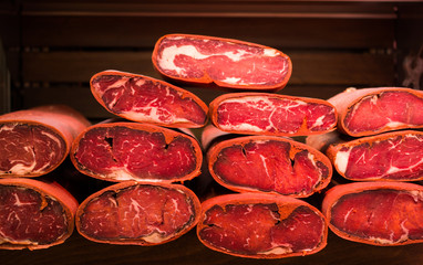 highly seasoned, air-dried cured beef