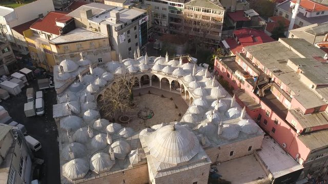 Mosque in Istanbul, Turkie. Sunny day. Aerial drone view shot. Blue sky, Daylight. City centre.