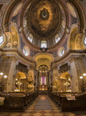 Fototapeta na wymiar The beautiful panoramic interior of St. Peter's Church (Peterskirche), a Baroque Roman Catholic parish church in Vienna, Austria