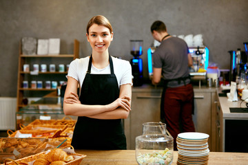 Pastry Shop. Portrait Of Young Woman Working In Bakery 