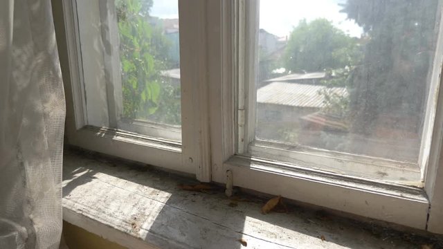 Professional video of Window of an old house in 4K Slow motion 60fps