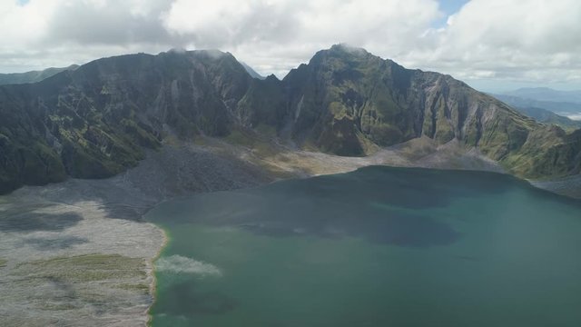 Crater lake of the volcano Pinatubo among the mountains, Philippines, Luzon. Beautiful landscape at Pinatubo mountain crater lake. Travel concept