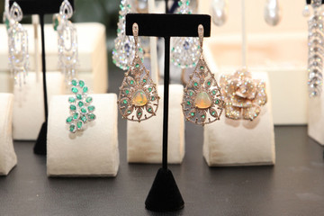 Earrings huge, multi-tiered with diamonds, emeralds and moonstone