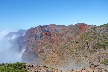 Hiking trail GR131 Rute de los Volcanes leading on the edge of Caldera de Taburiente which is the largest erosion crater in the world, La Palma, Canary Islands, Spain