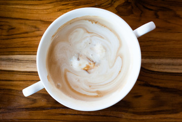 Vanilla icecream melted and blended with shot of espresso coffee in cute mug, Affogato