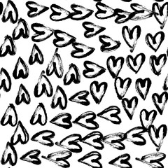 Seamless artistic abstract heart pattern. Hand drawn repeatable creative background. Paint stain grunge design from painted texture. Black and white brush strokes drawing.