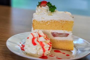 strawberry cake on white plate