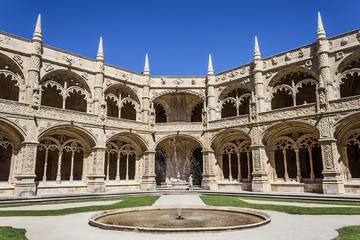 Fototapeta premium Lisbon, Portugal - June 6, 2013: Cloister of the Jeronimos Monastery or Abbey in Lisbon, Portugal, aka Santa Maria de Belem monastery. UNESCO World Heritage it Masterpiece of the Manueline art.