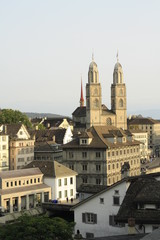 Fototapeta na wymiar view of Zurich old city, Switzerland, including church towers and historical buildings on a sunny afternoon.