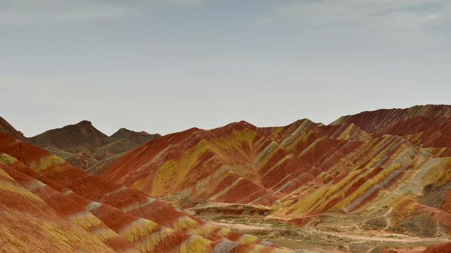 Timelapse Movie of Moving Cloud at  Zhangye Danxia National Geopark, Gansu, China. Colorful landscape of rainbow mountains