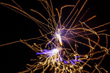 The fireworks lights randomly move like atoms of matter