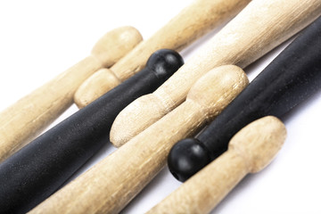 many drum sticks of two colors isolate