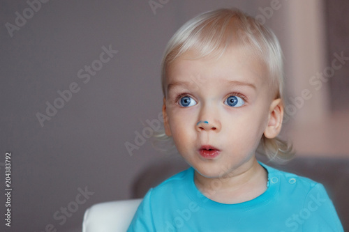Cute Boy With Blond Hair And Blue Eyes Stock Photo And Royalty