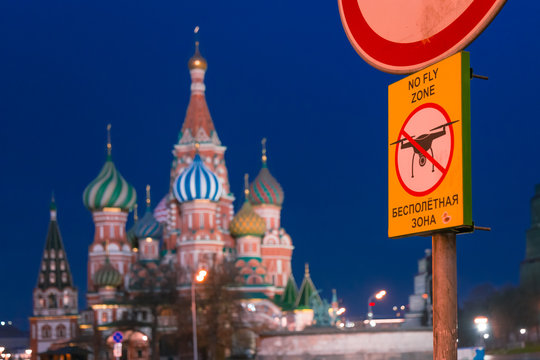 View of St. Basil's Cathedral on Red Square. Evening, before sunset. No fly zone sign.  Drones prohibited. Prohibiting. Kremlin