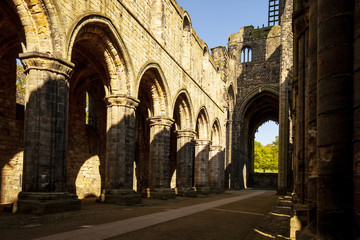 Naklejka premium Inside medieval Kirkstall Abbey in Leeds, Great Britain.