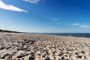 Fototapeta na wymiar Traces in the sand on the Baltic Sea