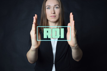 A businessman shows an inscription:ROI