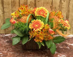 Orange Flower Piece on Marble Table