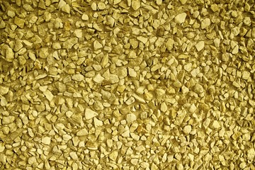 Ultra yellow Pebble textured surface, stone backdrop and boulder background