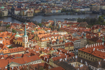 Fototapeta na wymiar View to Prague from the bell tower of St Vitus Cathedral 