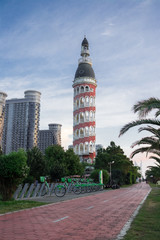 Obraz premium Batumi old tower situated on Batumi new boulevard promenade walking coastline. With restaurant inside. Old city building in Batumi, Adjaria, Georgia.