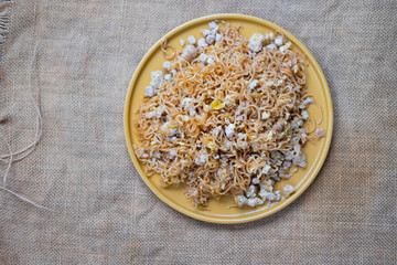 Stir fried instant noodle with minced pork and egg