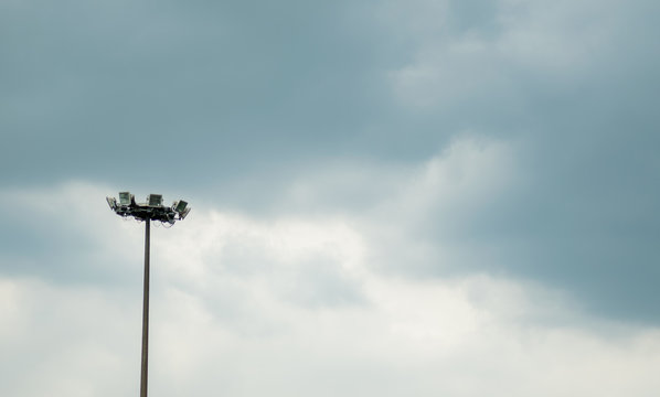 Tapered Steel Pole in couldy sky.