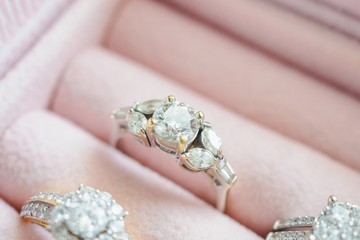 Gold and silver diamond ring in luxury jewelry box