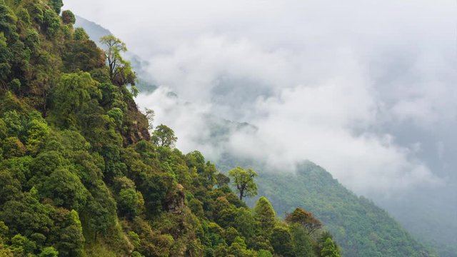 Timelapse of rolling clouds in mountainous landscape in Lamjung district, Nepal