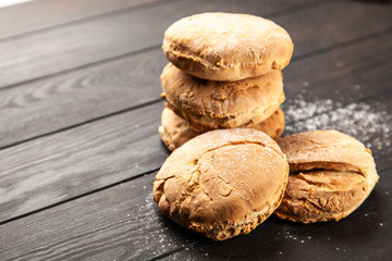 Homemade buns on dark background